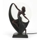 A bronzed lamp in the form of an Art Deco female with glass shade, 37cm high : For Further Condition