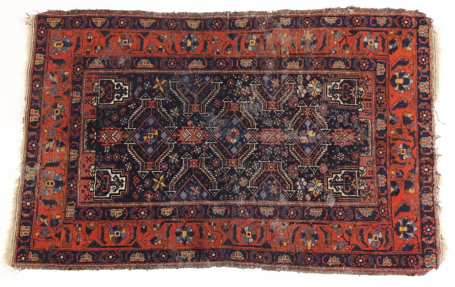 Red and blue ground geometric pattern rug, 145cm x 90cm : For Further Condition Reports Please Visit