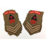 Pair of British military World War II Royal Norfolk cloth patches and epaulettes relating to J.