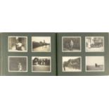 Early 20th century black and white photographs arranged in an album, including Duke of Devonshire,