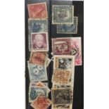 World stamps including Nigeria, Gold Coast and Falkland Islands, arranged in an album : For