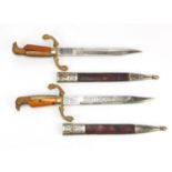 Pair of Spanish Toledo swords with scabbards, each 38cm in length : For Further Condition Reports