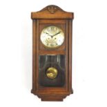 Oak cased wall hanging clock striking on a gong, 80cm high : For Further Condition Reports Please