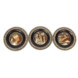 Set of three Egyptian ebonised plates, 25cm diameter : For Further Condition Reports Please Visit