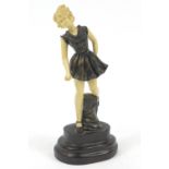 Art Deco style bronzed and ivorine figure of a young girl, 22cm high : For Further Condition Reports