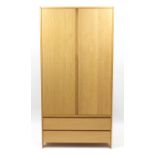 Contemporary lightwood two door wardrobe with two drawers to the base, 200cm H x 100cm W x 56cm