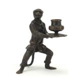 Patinated bronze candlestick in the form of a monkey, 16cm high : For Further Condition Reports