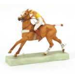 Royal Worcester hand painted porcelain polo player on horse back modelled by Doris Lindner, numbered