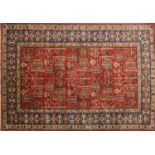 Red and blue ground rug with all over geometric design, 140cm x 102cm : For Further Condition