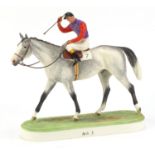 Royal Worcester hand painted porcelain jockey on horseback, The Winner, numbered 3625, 25cm high :