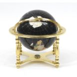 Brass framed gemstone table globe with undertier, 45cm high : For Further Condition Reports Please