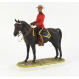 Royal Worcester hand painted porcelain Royal Canadian mounted policeman, 28cm high : For Further