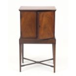 Early 19th century mahogany collector's cabinet on stand, fitted a pair of doors enclosing four