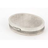 Oval silver box and cover with hinged lid, impressed SILVER to the base, 10cm in length, 95.8g : For