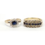 Two 9ct gold blue and clear sapphire rings, sizes L and O, 4.5g : For Further Condition Reports