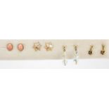 Four pairs of 9ct gold earrings including coral and garnet : For Further Condition Reports Please