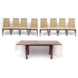 1970's Danish rosewood extending dining table and eight chairs by Dyrlund, the table with extra