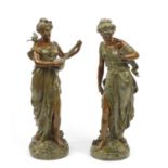 Pair of Art Nouveau cold painted spelter figures of maidens, the largest 49cm high :For Further