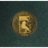 Sir Winston Churchill 18ct gold commemorative coin, 3.5g :For Further Condition Reports Please visit
