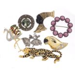 Costume brooches including silver ballerinas and enamelled animals :For Further Condition Reports