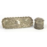 Victorian silver pen tray and cylindrical box and cover by William Comyns, each embossed with