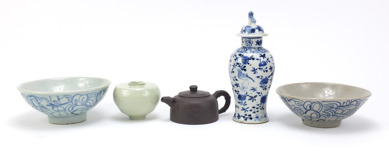 Chinese ceramics including a Celadon glazed vase, Yixing teapot, and blue and white baluster vase