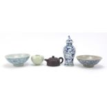 Chinese ceramics including a Celadon glazed vase, Yixing teapot, and blue and white baluster vase