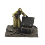 Cold painted bronze of an Arab on a carpet in the style of Franz Xaver Bergmann, 13cm x 13cm :For