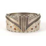 Victorian Aesthetic silver bangle, stamped sterling to the clasp, 37.4g :For Further Condition