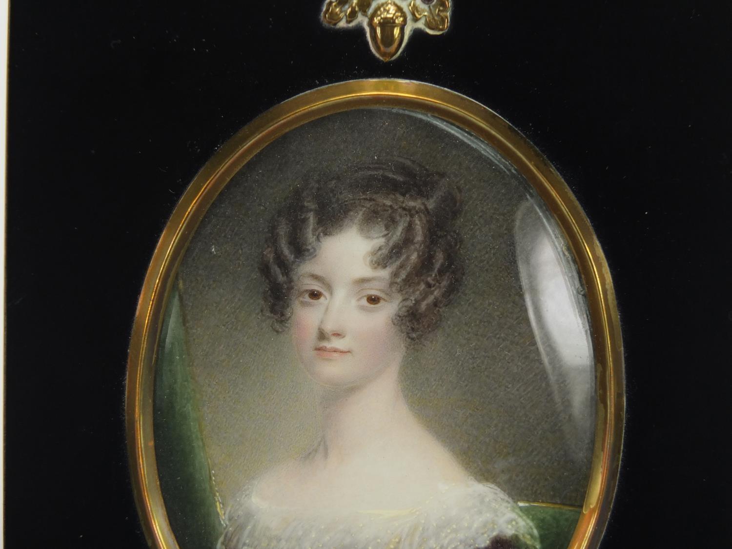 19th century oval hand painted portrait miniature of a young female, housed in an ebonised frame, - Image 3 of 4