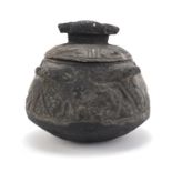 Islamic black stone pot and cover carved with mythical animals, 19cm high :For Further Condition