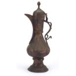 Islamic copper water pot engraved with flowers, 39cm high :For Further Condition Reports Please