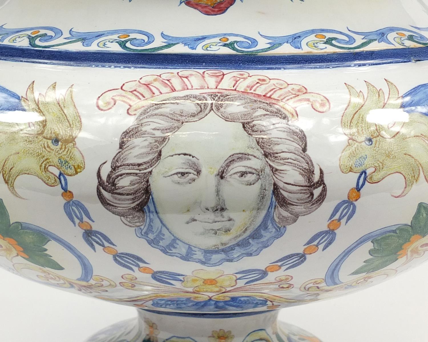 Large continental Faience glazed pottery centrepiece with twin handles, hand painted with mythical - Image 2 of 6