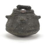 Islamic black stone pot and cover carved with mythical animal, 19cm high :For Further Condition