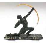 Art Deco patinated spelter sculpture of an archer raised on a rectangular marble base, 52.5cm