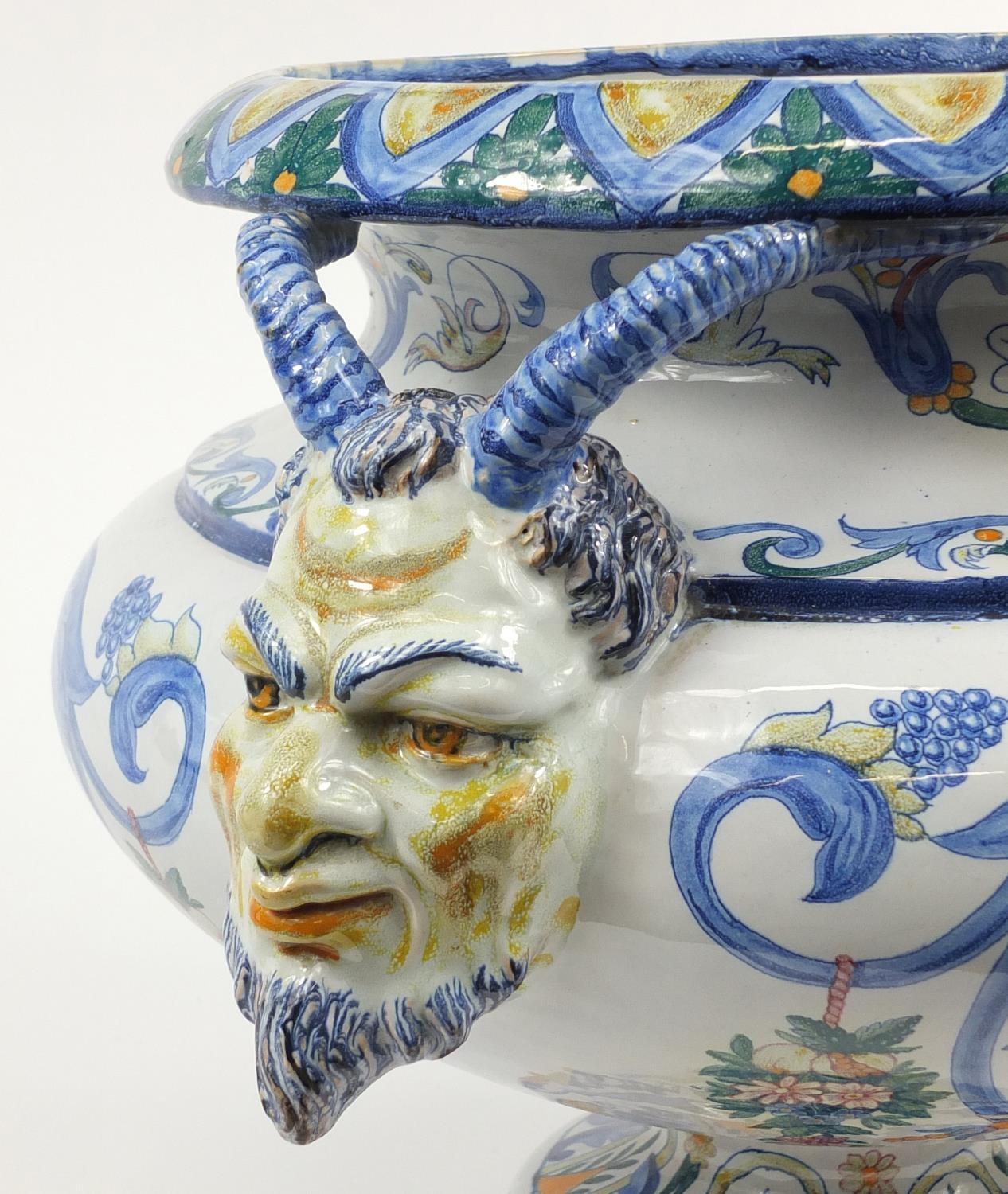 Large continental Faience glazed pottery centrepiece with twin handles, hand painted with mythical - Image 3 of 6