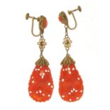 Good pair of Chinese gilt metal mounted coral drop earrings carved with fruit, 6.5cm in length, 7.4g