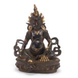 Chino Tibetan partially gilt bronze figure of Buddha with a rat, 31cm high :For Further Condition