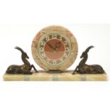 French Art Deco marble mantle clock mounted with two bronzed deer, 39.5cm wide :For Further