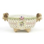 19th century Meissen porcelain pierced centrepiece with ram's head handles and feet, finely hand