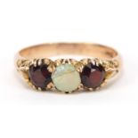 14ct gold opal and garnet ring, size O, 3.0g :For Further Condition Reports Please visit Our