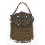 Early 20th century mesh miser's purse with jewelled butterfly design clasp and mirrored back, 13cm