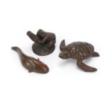 Three Japanese patinated bronze animals including a sea turtle and catfish, character marks to the