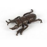 Japanese patinated bronze stag beetle, impressed marks to the underside, 6cm in length :For