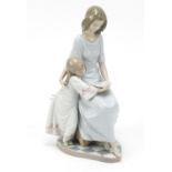 Lladro figure group a bedtime story, numbered 5457, 27cm high :For Further Condition Reports