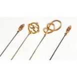 Four Art Nouveau 9ct gold hat pins, the largest 19.5cm in length :For Further Condition Reports