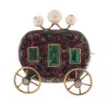 Antique unmarked gold carriage brooch with rotating wheels (tests as 15ct gold), set with
