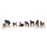 Eight Beswick and Royal Doulton brown horses, the largest 15cm in length :For Further Condition