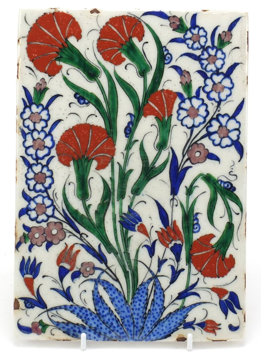 Iznik pottery tile hand painted with flowers, 24.5cm x 17cm :For Further Condition Reports Please