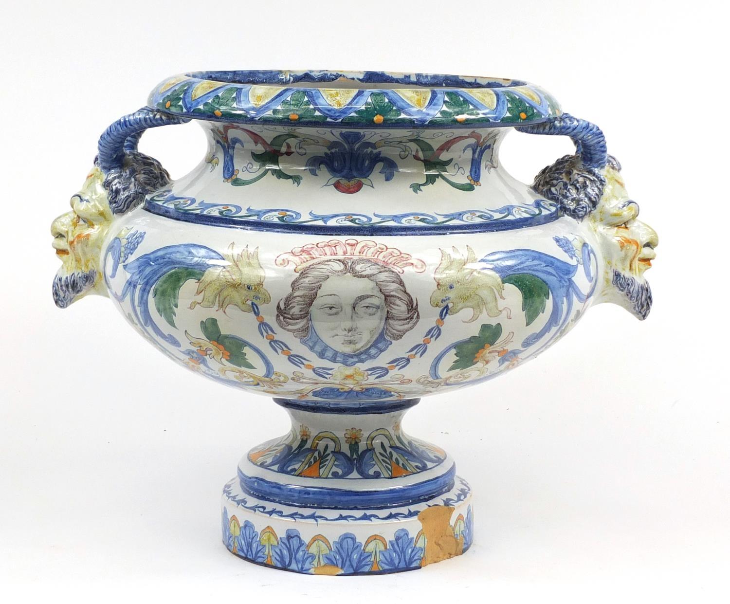 Large continental Faience glazed pottery centrepiece with twin handles, hand painted with mythical - Image 4 of 6